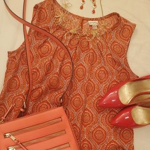 Sleeveless multi-color pattern flow-y blouse